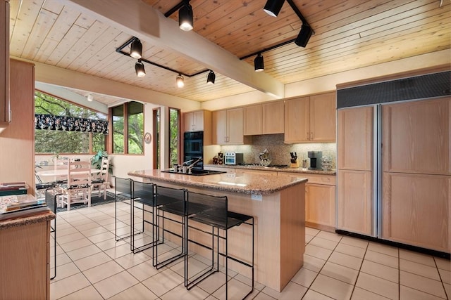 12 Laurus Ln, Newton, MA 02459 - kitchen featuring paneled built in fridge, track lighting, light brown cabinets, light tile patterned flooring, and wood ceiling