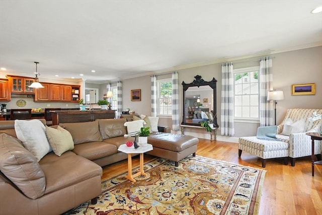 149 Acorn St, Marshfield, MA 02050 - living room featuring recessed lighting, ornamental molding, and light wood-style floors