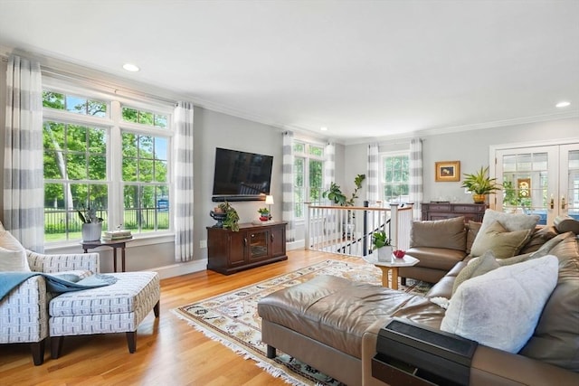 149 Acorn St, Marshfield, MA 02050 - living area featuring ornamental molding, wood finished floors, recessed lighting, french doors, and baseboards