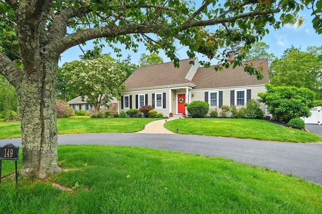 149 Acorn St, Marshfield, MA 02050 - view of front of home featuring a front lawn and a chimney