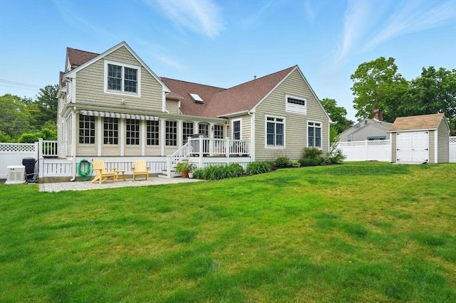 149 Acorn St, Marshfield, MA 02050 - back of property featuring a deck, a shingled roof, and a patio area