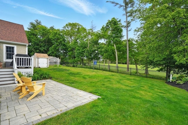 149 Acorn St, Marshfield, MA 02050 - view of yard with a patio area and view of wooded area