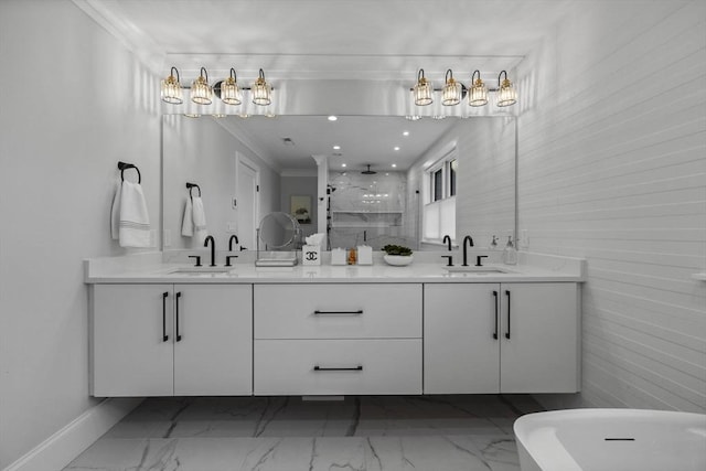 bathroom featuring crown molding, vanity, and separate shower and tub