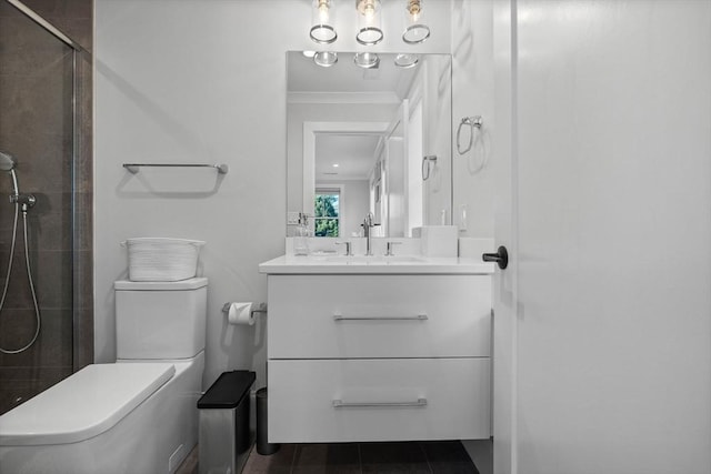 bathroom featuring vanity, tile patterned floors, toilet, and walk in shower