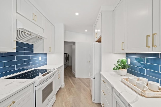 44 Ober Rd Unit 44, Newton, MA 02459 - kitchen featuring white appliances, white cabinetry, light wood-style flooring, decorative backsplash, and recessed lighting