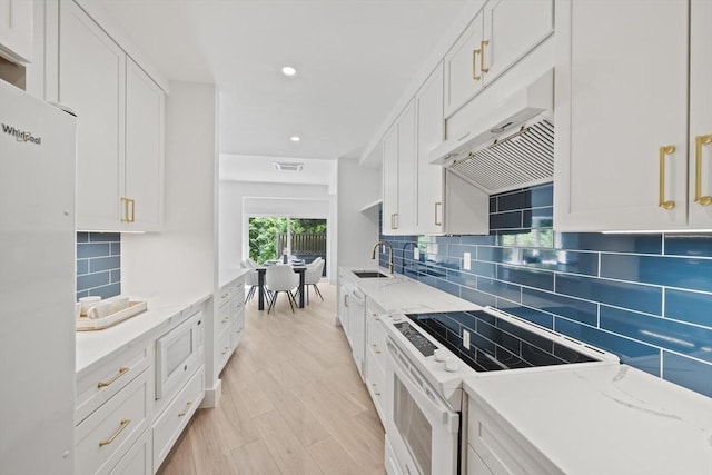 44 Ober Rd Unit 44, Newton, MA 02459 - kitchen with white appliances, white cabinets, recessed lighting, and tasteful backsplash