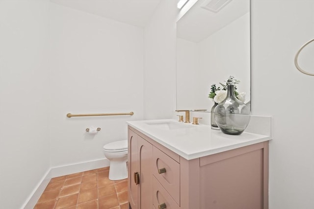 44 Ober Rd Unit 44, Newton, MA 02459 - half bath featuring vanity, baseboards, toilet, and tile patterned floors