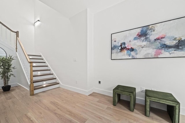 44 Ober Rd Unit 44, Newton, MA 02459 - unfurnished room featuring stairs, light wood-style flooring, and baseboards