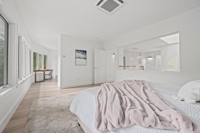 44 Ober Rd Unit 44, Newton, MA 02459 - bedroom featuring light wood finished floors and baseboards