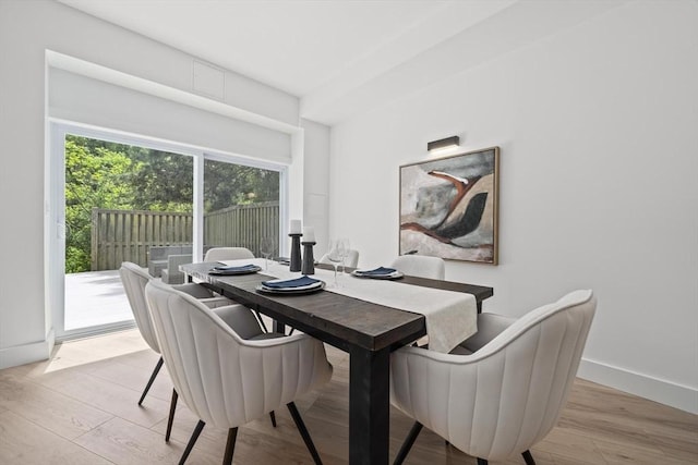 44 Ober Rd Unit 44, Newton, MA 02459 - dining space with light wood-style flooring and baseboards