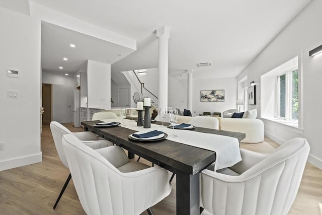 44 Ober Rd Unit 44, Newton, MA 02459 - dining space featuring baseboards, light wood-type flooring, and stairs