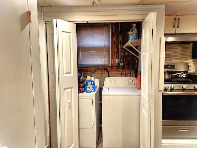 laundry area featuring laundry area and washer and clothes dryer