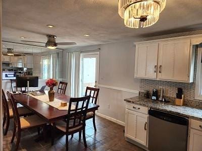 dining space featuring baseboards, a ceiling fan, and recessed lighting