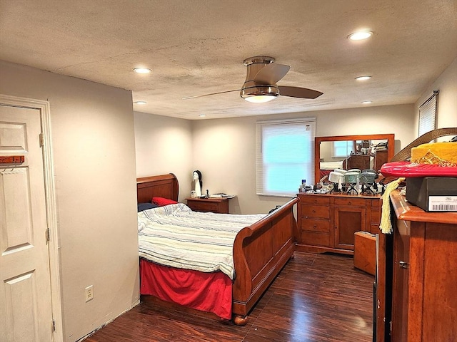 bedroom featuring ceiling fan, multiple windows, dark wood finished floors, and recessed lighting