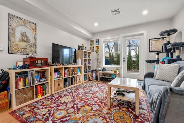 425 Lagrange St Unit 107, Boston, MA 02132 - living area featuring wood finished floors and recessed lighting