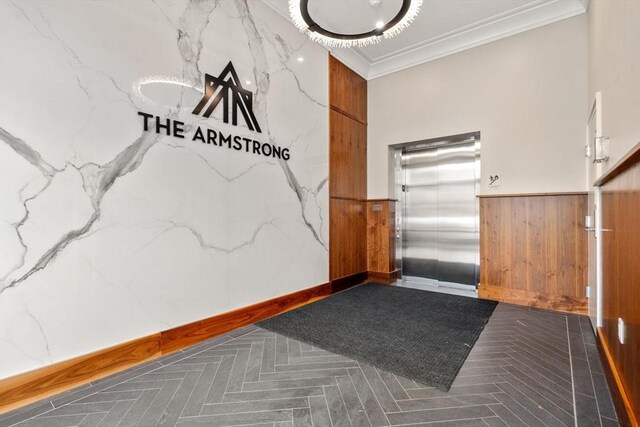 425 Lagrange St Unit 107, Boston, MA 02132 - reception with wainscoting and crown molding