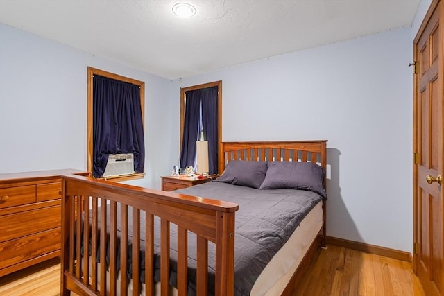 8 Macleod Ln, Acton, MA 01720 - bedroom with light wood-style floors and baseboards