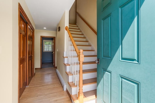 8 Macleod Ln, Acton, MA 01720 - entryway with baseboard heating, stairway, light wood-style floors, baseboards, and recessed lighting