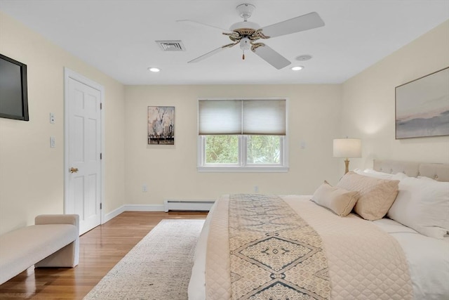 100 Summit, Brookline, MA 02446 - bedroom featuring wood finished floors, a baseboard heating unit, baseboards, recessed lighting, and ceiling fan