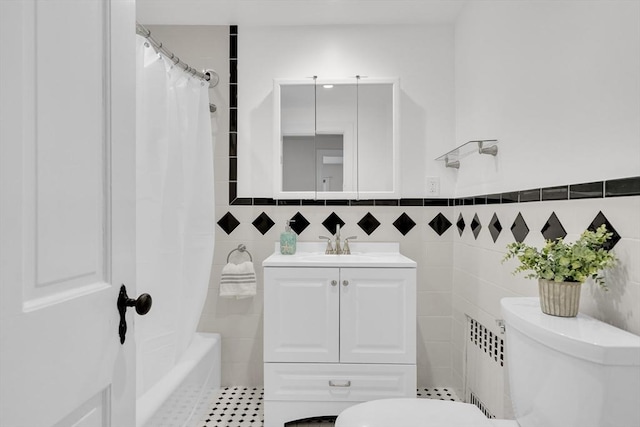 100 Summit, Brookline, MA 02446 - full bath with toilet, radiator, vanity, shower / bath combo, and tile walls