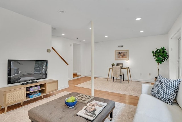 100 Summit, Brookline, MA 02446 - living area featuring wood finished floors, recessed lighting, and stairway