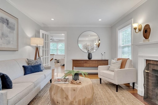 100 Summit, Brookline, MA 02446 - living room featuring crown molding, a fireplace, recessed lighting, ceiling fan, and wood finished floors