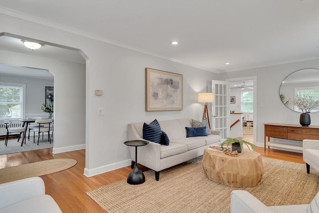 100 Summit, Brookline, MA 02446 - living room featuring wood finished floors, arched walkways, recessed lighting, ornamental molding, and baseboards