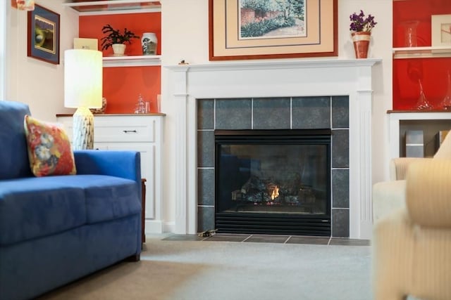 sitting room featuring a fireplace