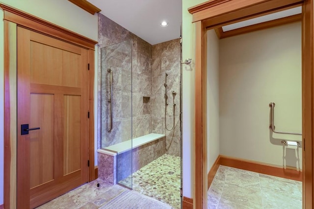 bathroom featuring tiled shower