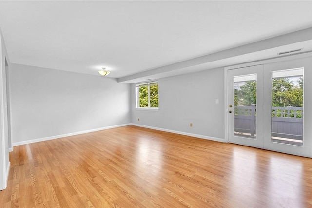 360 Littleton Rd Unit A5, Chelmsford, MA 01824 - empty room featuring light wood-style flooring and baseboards