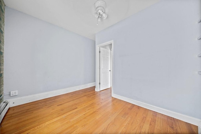 633 E Sixth St, Boston, MA 02127 - empty room featuring wood finished floors, baseboards, baseboard heating, and ceiling fan