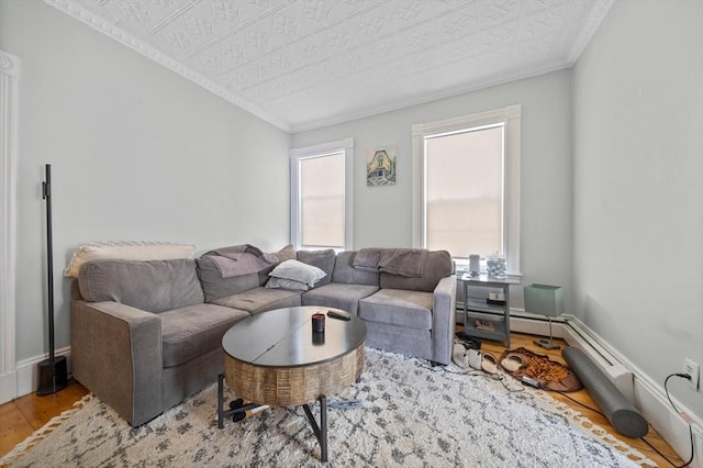 633 E Sixth St, Boston, MA 02127 - living area featuring wood finished floors and ornamental molding