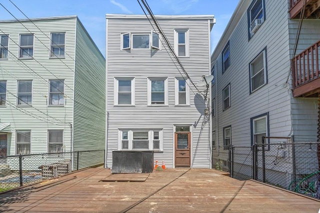 633 E Sixth St, Boston, MA 02127 - rear view of property featuring a wooden deck