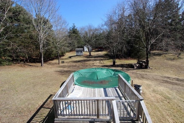 view of yard featuring a wooden deck