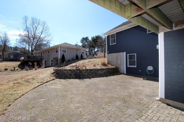 view of home's exterior with a patio area