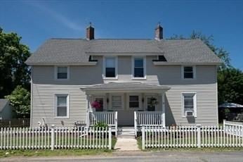 16-18 Orchard St, Grafton, MA 01560 - view of front of home featuring a porch and a fenced front yard
