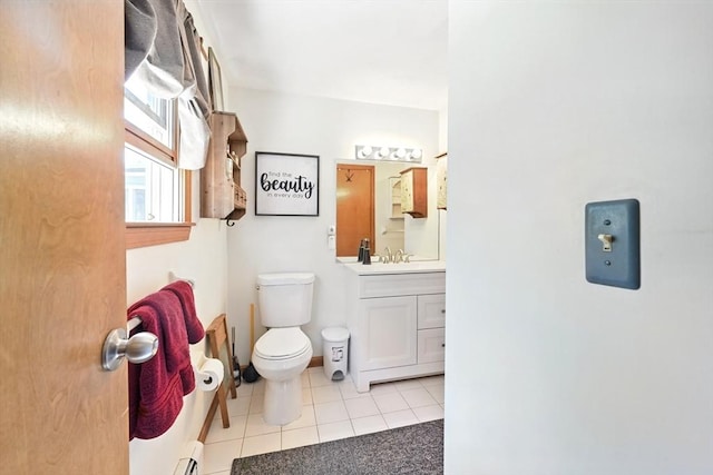 81 Crosstown Ave, Boston, MA 02132 - bathroom with tile patterned flooring, vanity, toilet, and baseboard heating