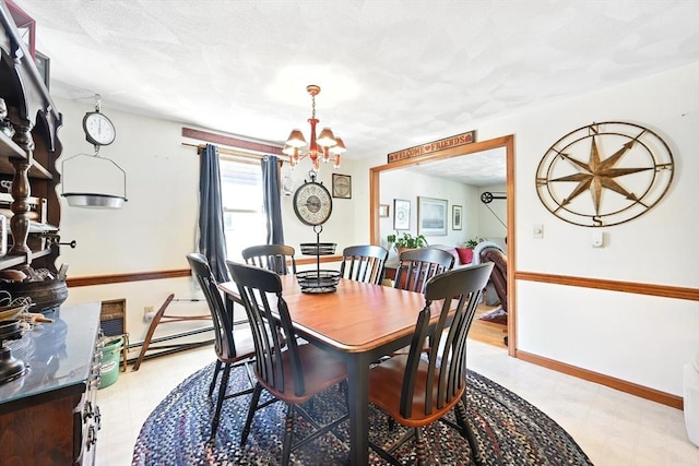 81 Crosstown Ave, Boston, MA 02132 - dining space featuring a chandelier, light floors, and baseboards