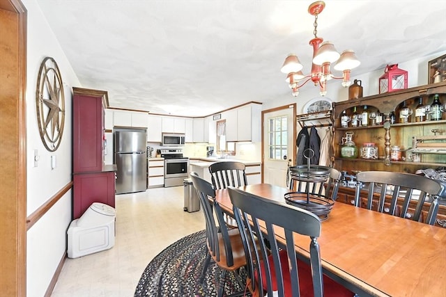 81 Crosstown Ave, Boston, MA 02132 - dining area featuring a chandelier, light flooring, and baseboards