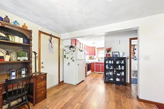 81 Crosstown Ave, Boston, MA 02132 - kitchen with white appliances, light wood-style flooring, baseboards, and a textured ceiling