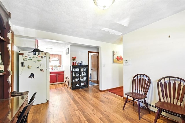 81 Crosstown Ave, Boston, MA 02132 - sitting room featuring hardwood / wood-style flooring, baseboards, and a textured ceiling