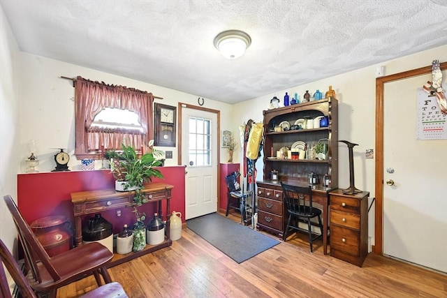 81 Crosstown Ave, Boston, MA 02132 - home office featuring wood finished floors and a textured ceiling