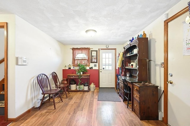 81 Crosstown Ave, Boston, MA 02132 - foyer entrance featuring wood-type flooring, a textured ceiling, and baseboards