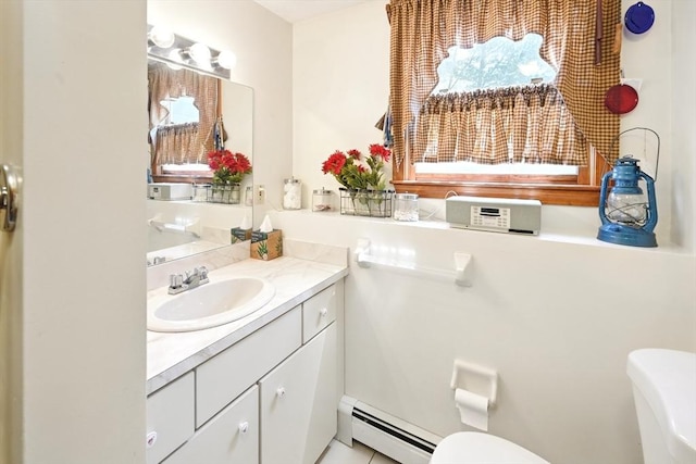 81 Crosstown Ave, Boston, MA 02132 - bathroom featuring baseboard heating, toilet, and vanity