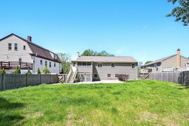 81 Crosstown Ave, Boston, MA 02132 - rear view of house featuring stairway and a chimney