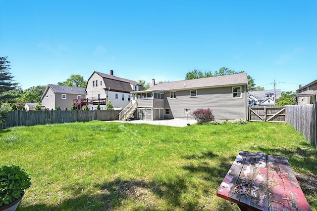 81 Crosstown Ave, Boston, MA 02132 - back of property featuring a patio area and a sunroom