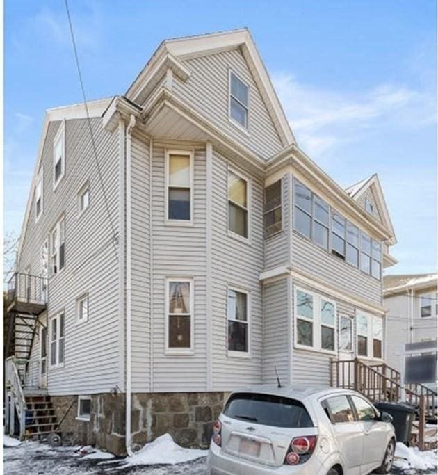 78 Endicott St, Peabody, MA 01960 - snow covered property featuring stairway
