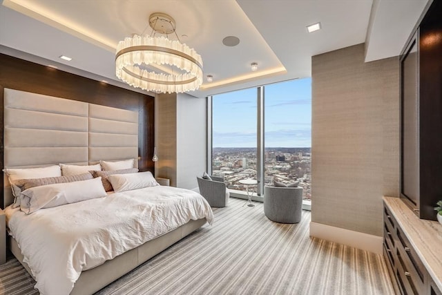 carpeted bedroom featuring a wall of windows