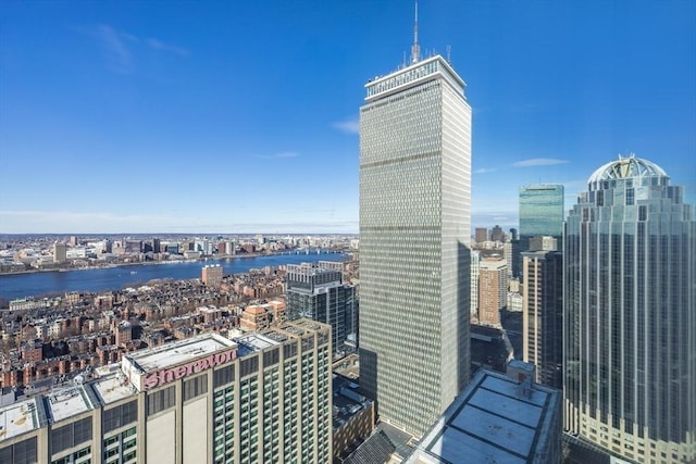 property's view of city with a water view