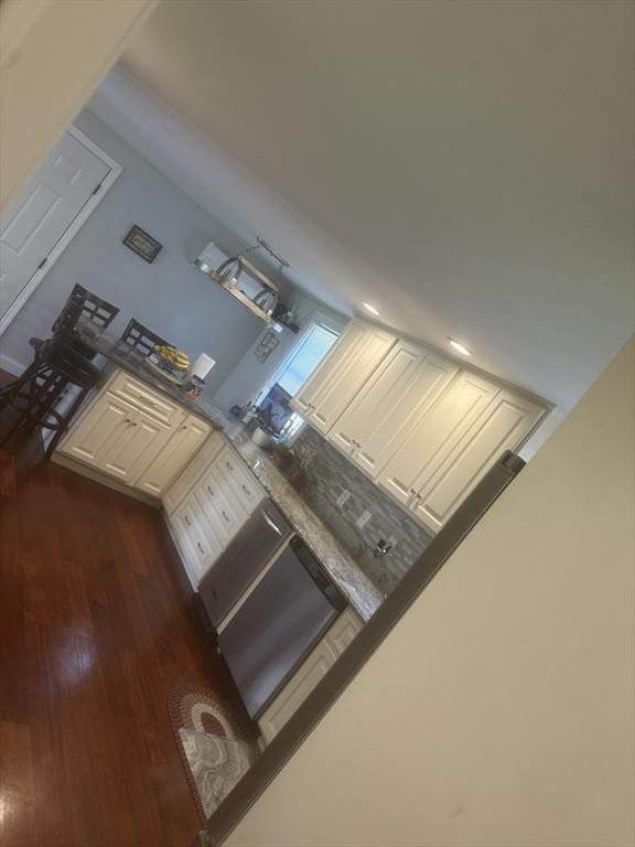 kitchen with dark wood-style flooring